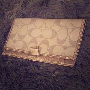 Coach check book cover